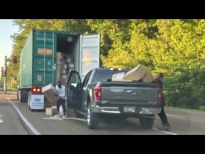 Thieves Rob an 18 wheelerTruck At Red Light In Front Of a Nike logistics center in Memphis